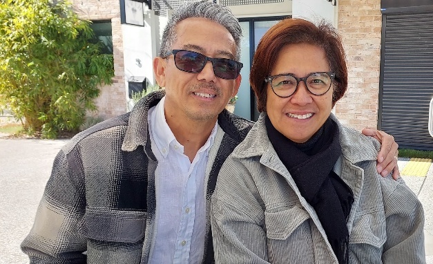 A person and person smiling for a picture AI-generated content may be incorrect.