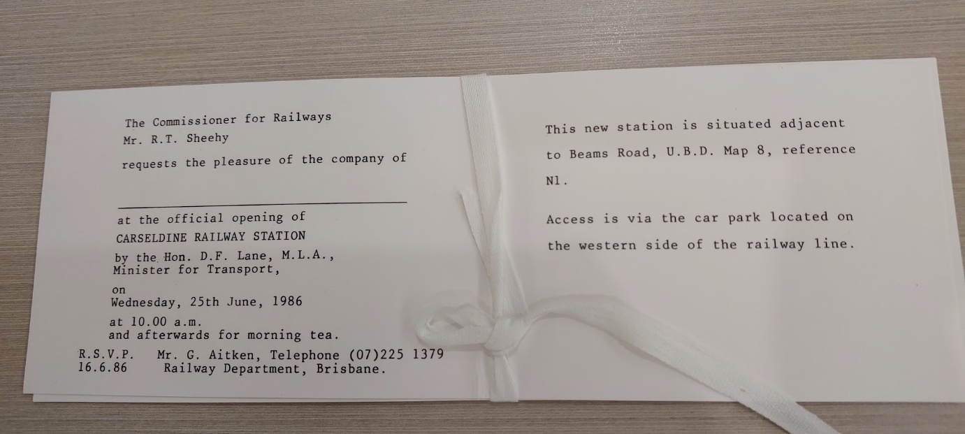 A white envelope tied with a white ribbon AI-generated content may be incorrect.