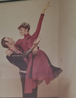 A person and person dancing AI-generated content may be incorrect.